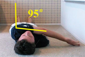 Image from golf strech DVD showing arm flexion